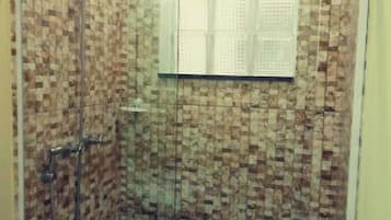Comfort Room | Bathroom | Shower, rainfall showerhead, towels, toilet paper