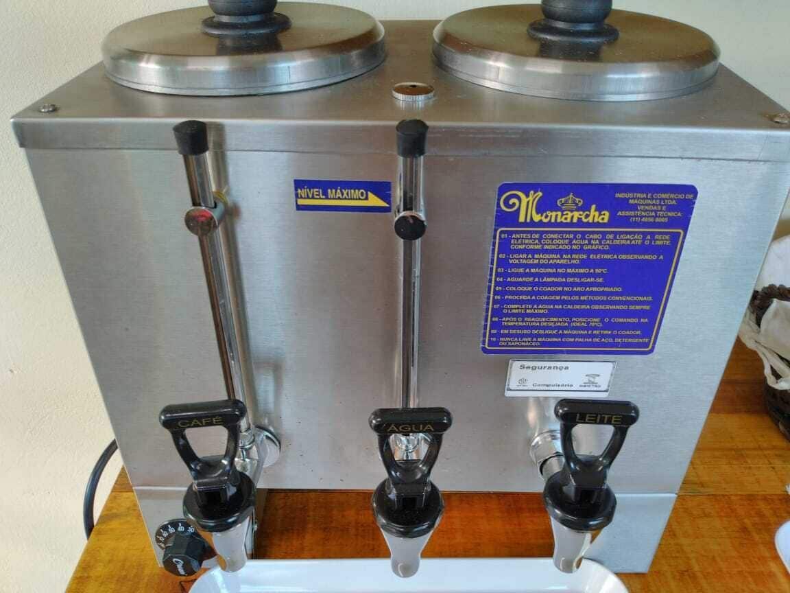 A Monarch branded coffee machine with three dispensers and a maximum level indicator.