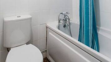 Apartment, 1 King Bed with Sofa bed | Bathroom | Separate bathtub and shower, deep-soaking bathtub, towels