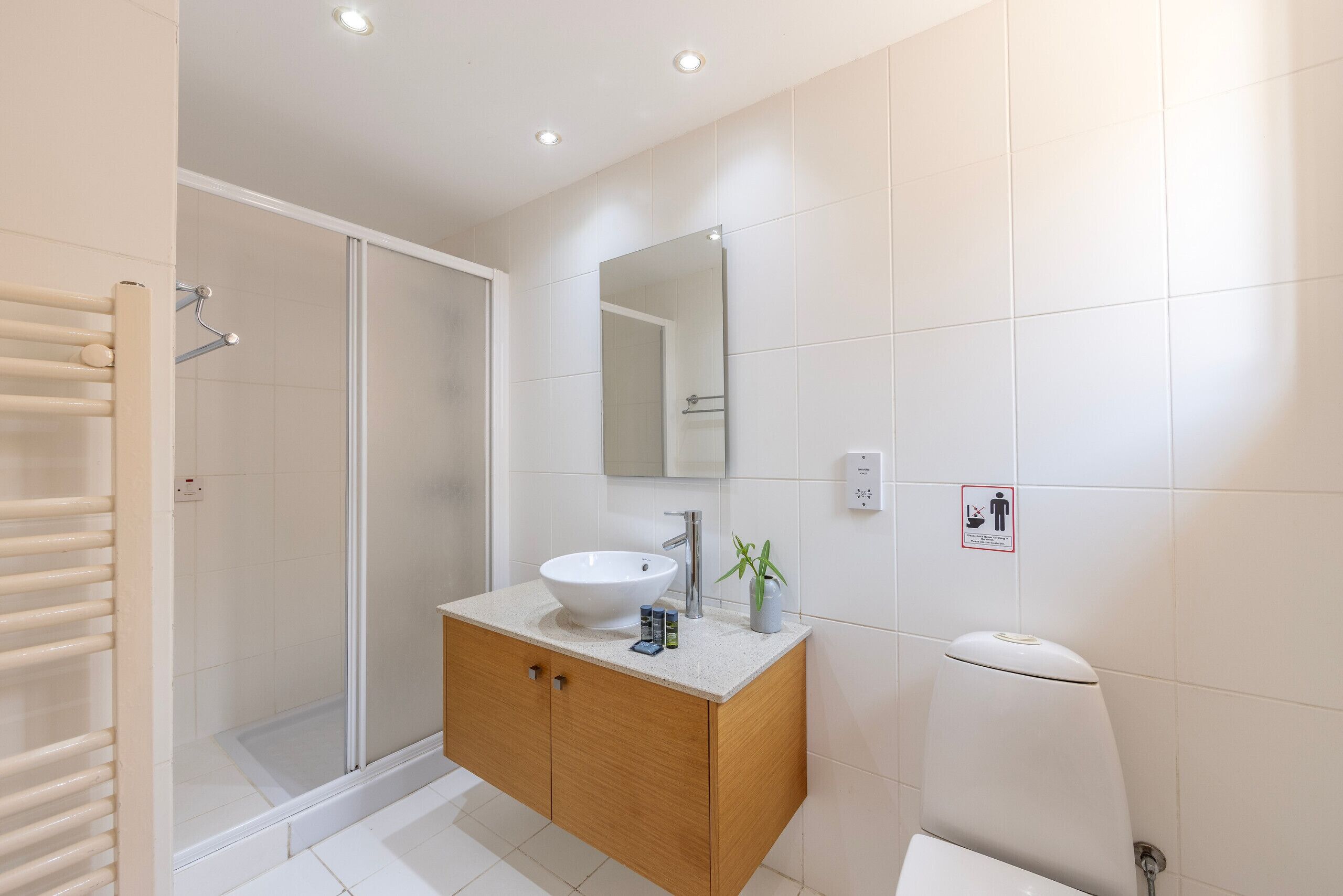 Bathtub, hair dryer, towels