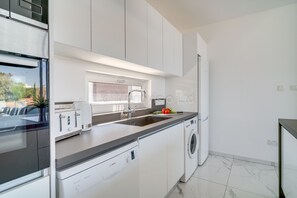 Fridge, microwave, oven, dishwasher