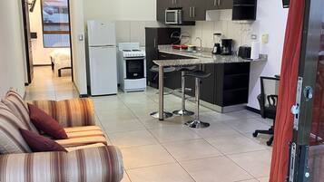 Fridge, microwave, coffee/tea maker, toaster