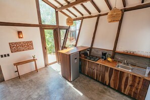 Full-sized fridge, stovetop, coffee/tea maker, toaster