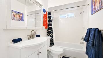 Shower, hair dryer, shampoo