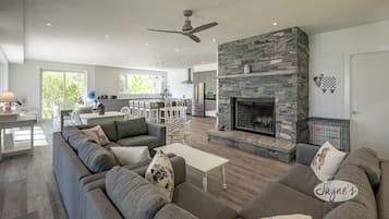 Smart TV, fireplace, books