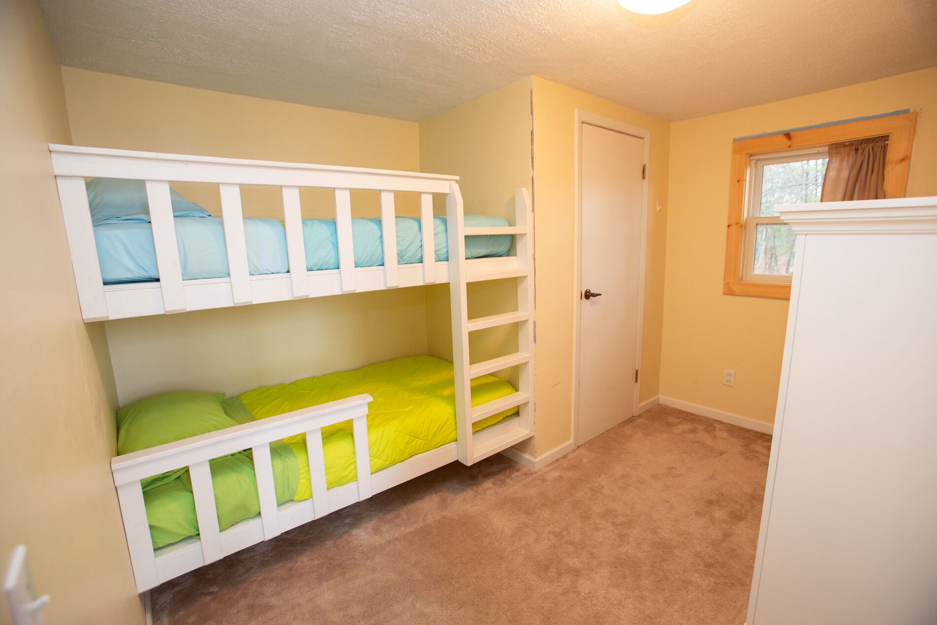 Charming 2 beds, 1 bath, and a loft with a lake front view and shoreline