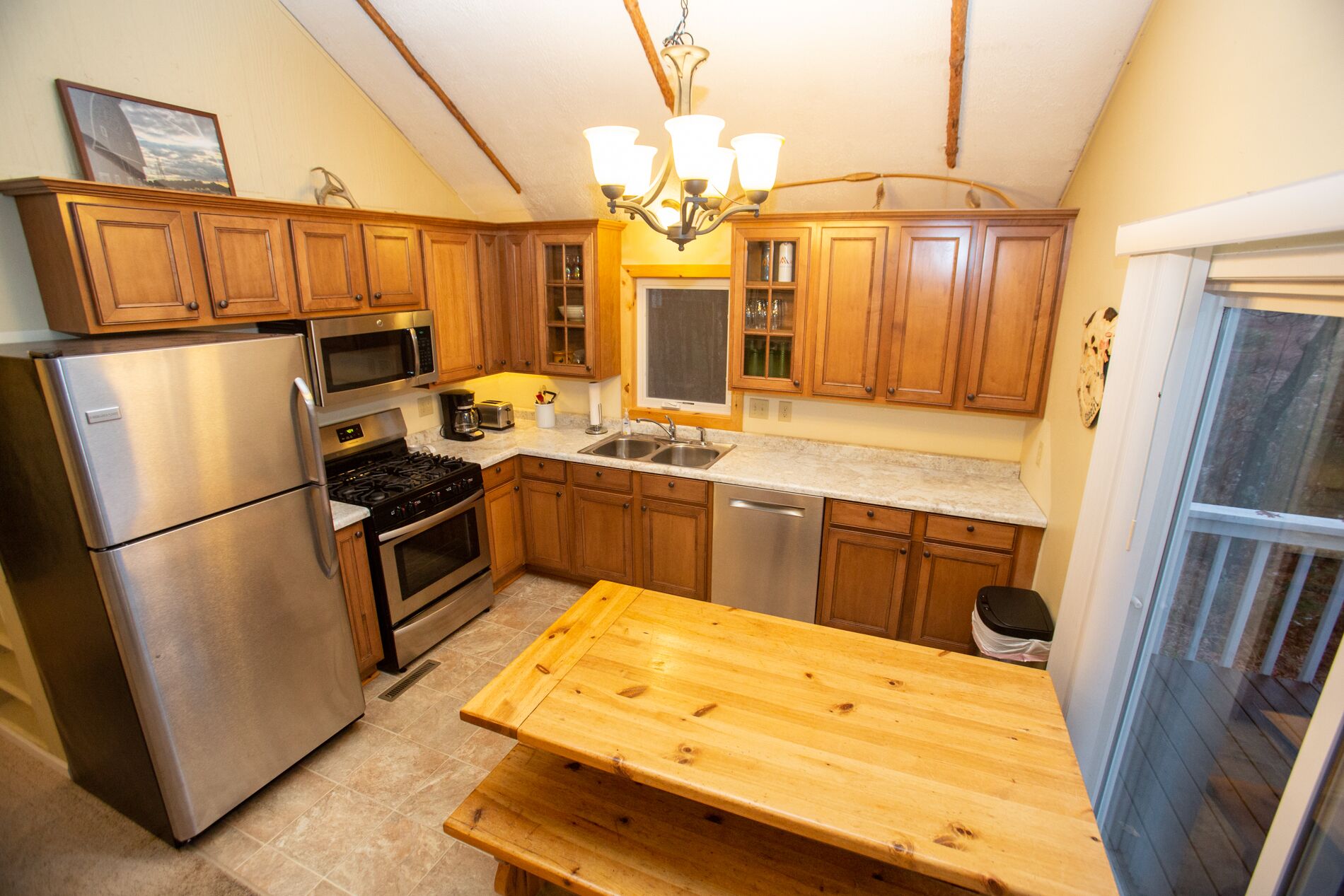 Charming 2 beds, 1 bath, and a loft with a lake front view and shoreline