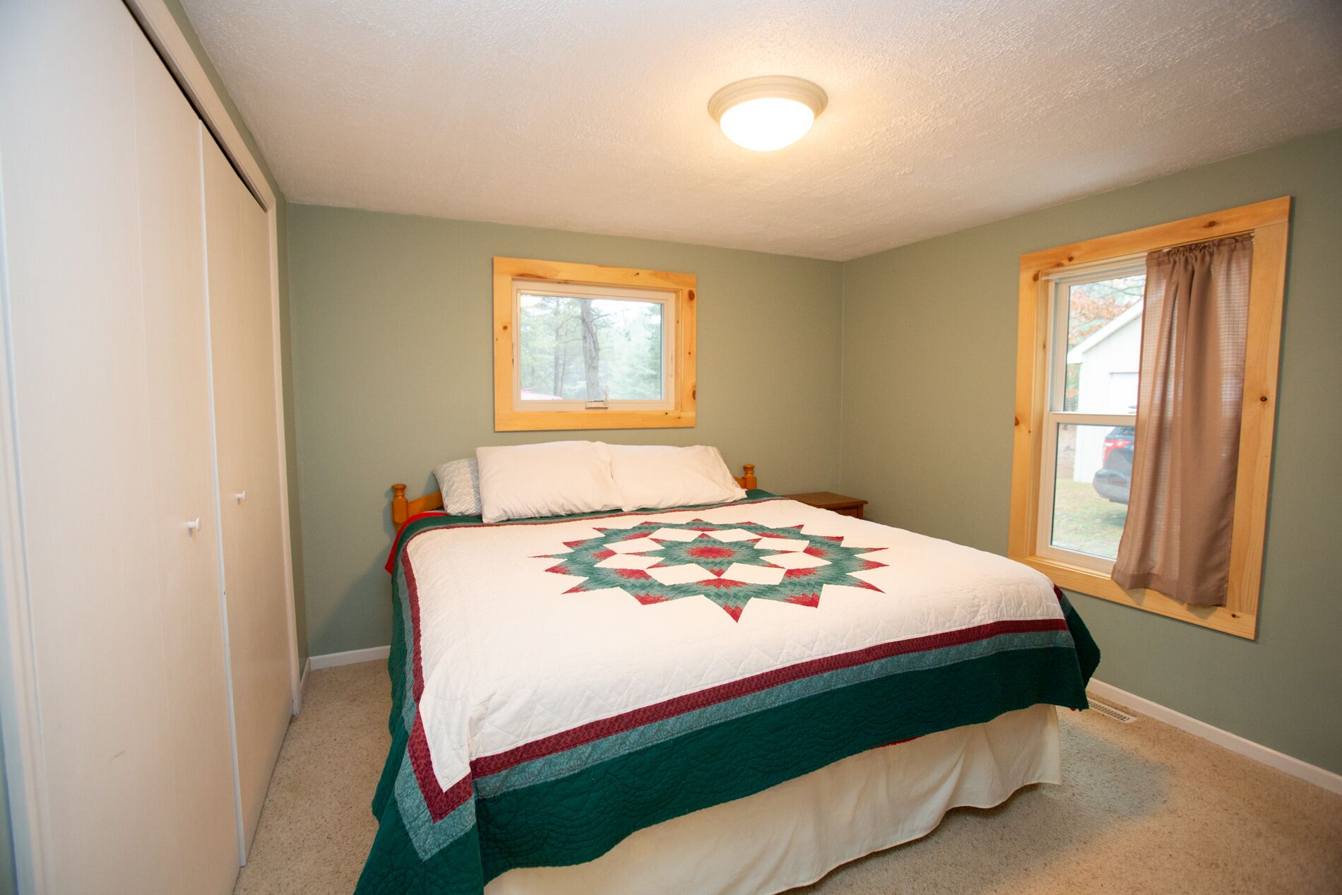 Charming 2 beds, 1 bath, and a loft with a lake front view and shoreline