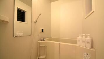 Hair dryer, bidet, towels, soap