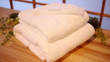 Hair dryer, bidet, towels, soap