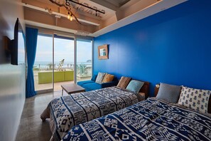 Quarto duplo (Ocean Front, 1A) | Wi-Fi de cortesia, roupa de cama
