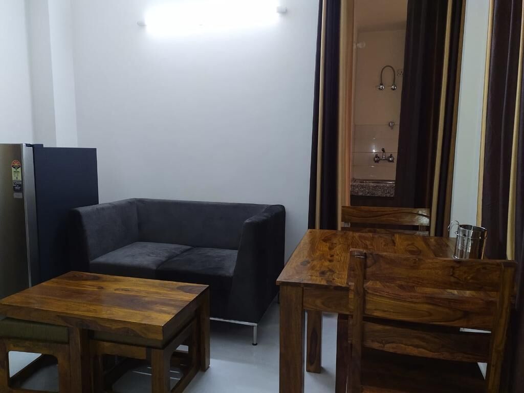 Family Apartment | Living room | 32-inch LED TV with cable channels, TV, Netflix