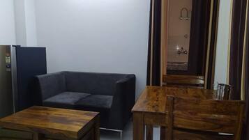 Family Apartment | Living room | 32-inch LED TV with cable channels, TV, Netflix