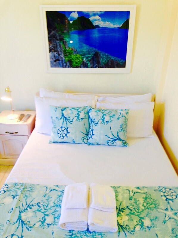 1 غرفة نوم ومكواة/لوح كي وواي فاي وملاءات أسرّة