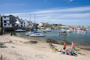Enjoy waterfront living with access to a marina and sandy beach.