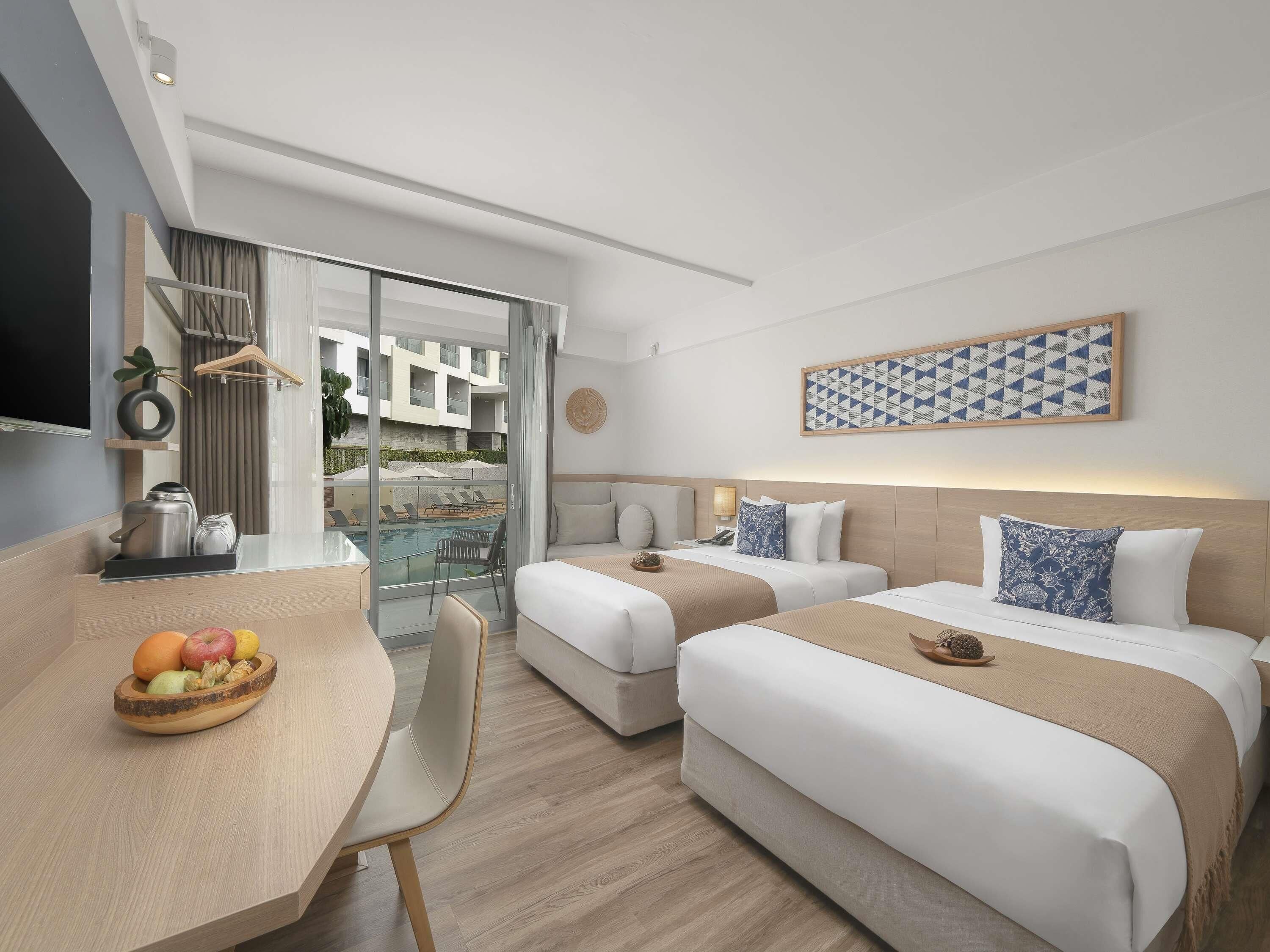 Superior Room, 2 Twin Beds, Balcony, Pool View | In-room safe, desk, laptop workspace, blackout drapes