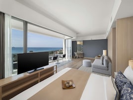 Suite, 1 King Bed, Balcony, Sea View | In-room safe, desk, laptop workspace, blackout drapes