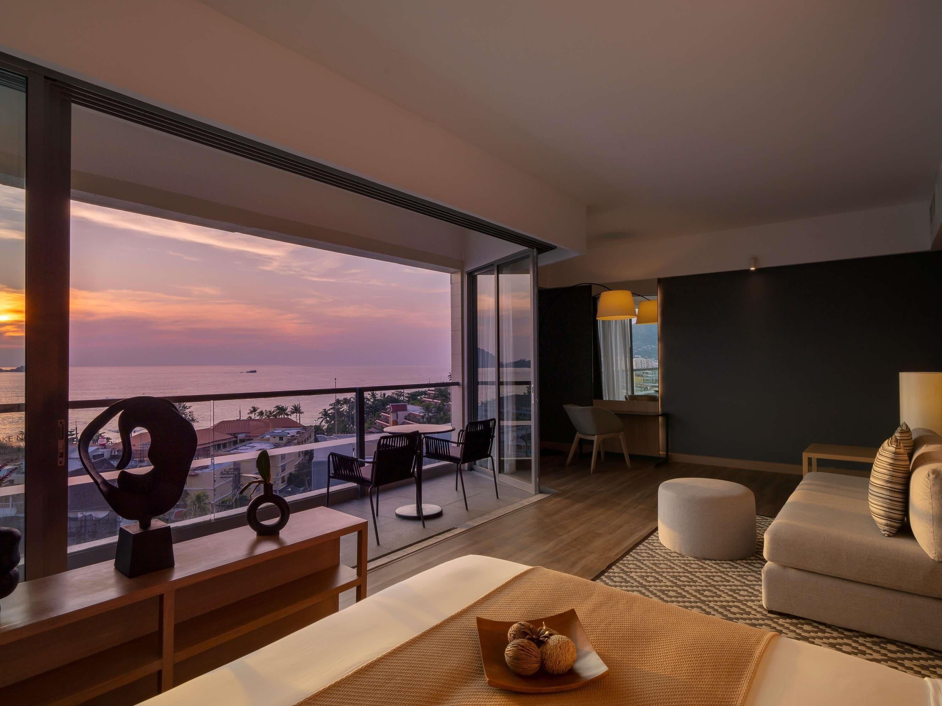 Suite, 1 King Bed, Balcony, Sea View | In-room safe, desk, laptop workspace, blackout drapes