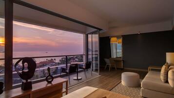 Suite, 1 King Bed, Balcony, Sea View | In-room safe, desk, laptop workspace, blackout drapes