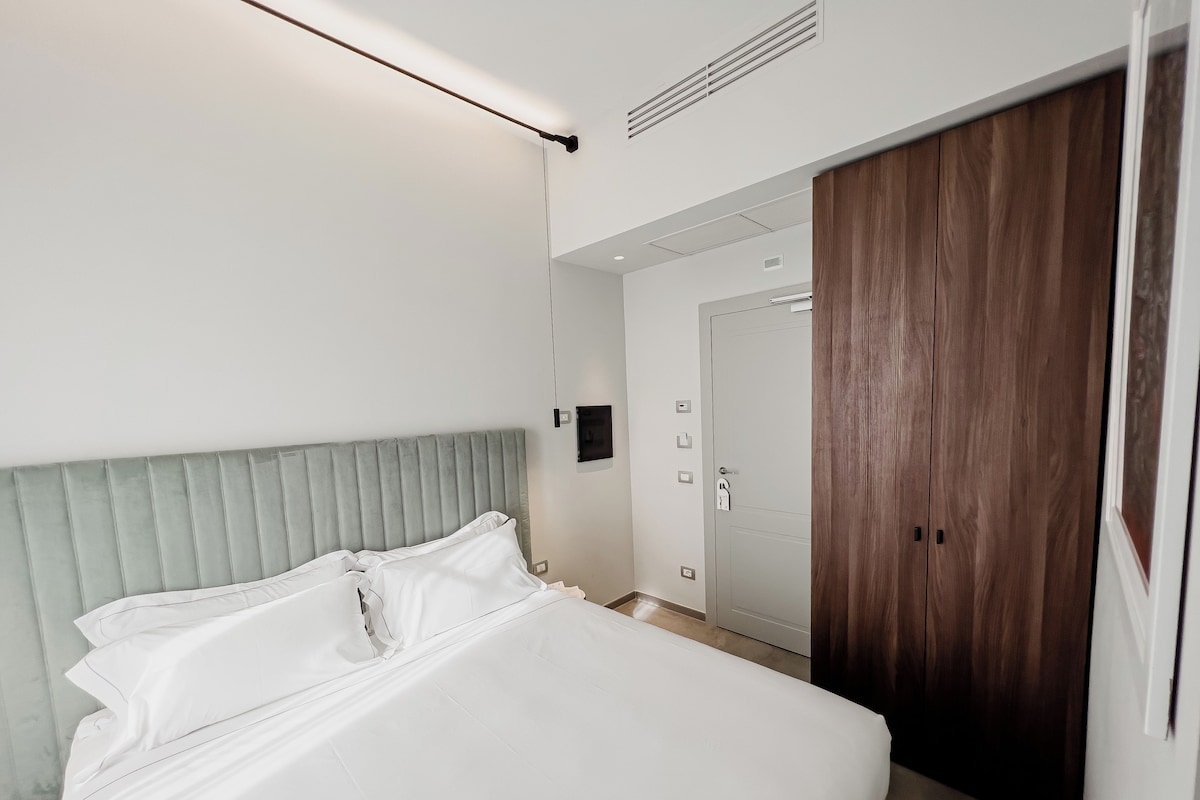 Habitación doble clásica | Edredón, camas con efecto memoria y minibar