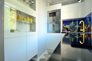Apartment | Private kitchen | Fridge, microwave, oven, stovetop