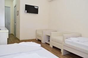 Desk, iron/ironing board, free WiFi, bed sheets - Pakhtakor Athletics hotel (Tashkent)