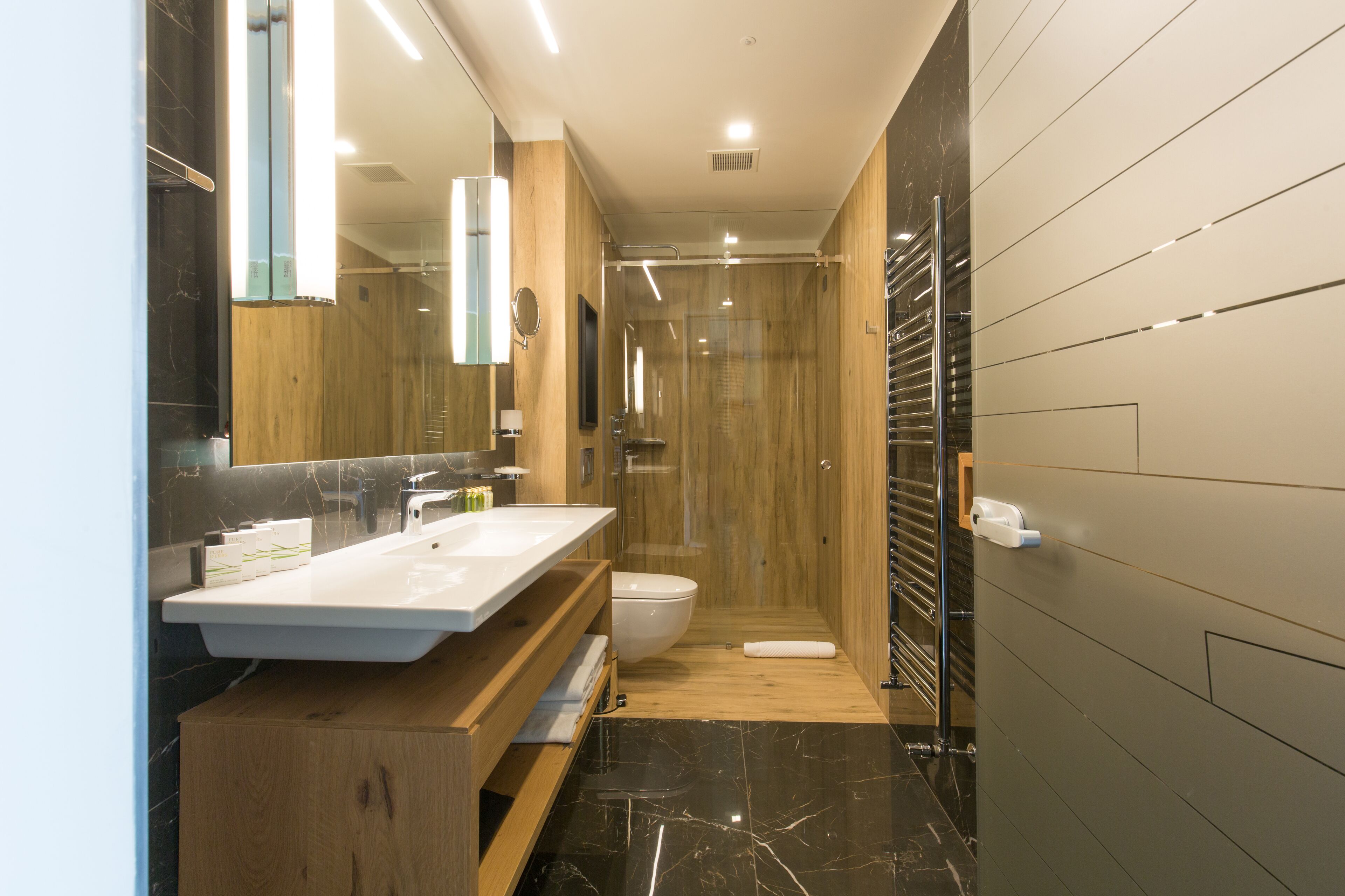 shower, hair dryer, bathrobes, slippers