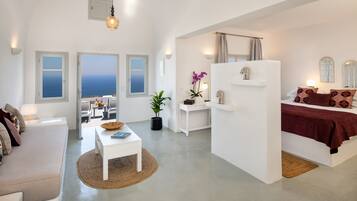 Deluxe-Suite, Whirlpool, Meerblick | Wohnbereich | 42-Zoll-Flachbildfernseher mit Satellitenempfang, Fernseher