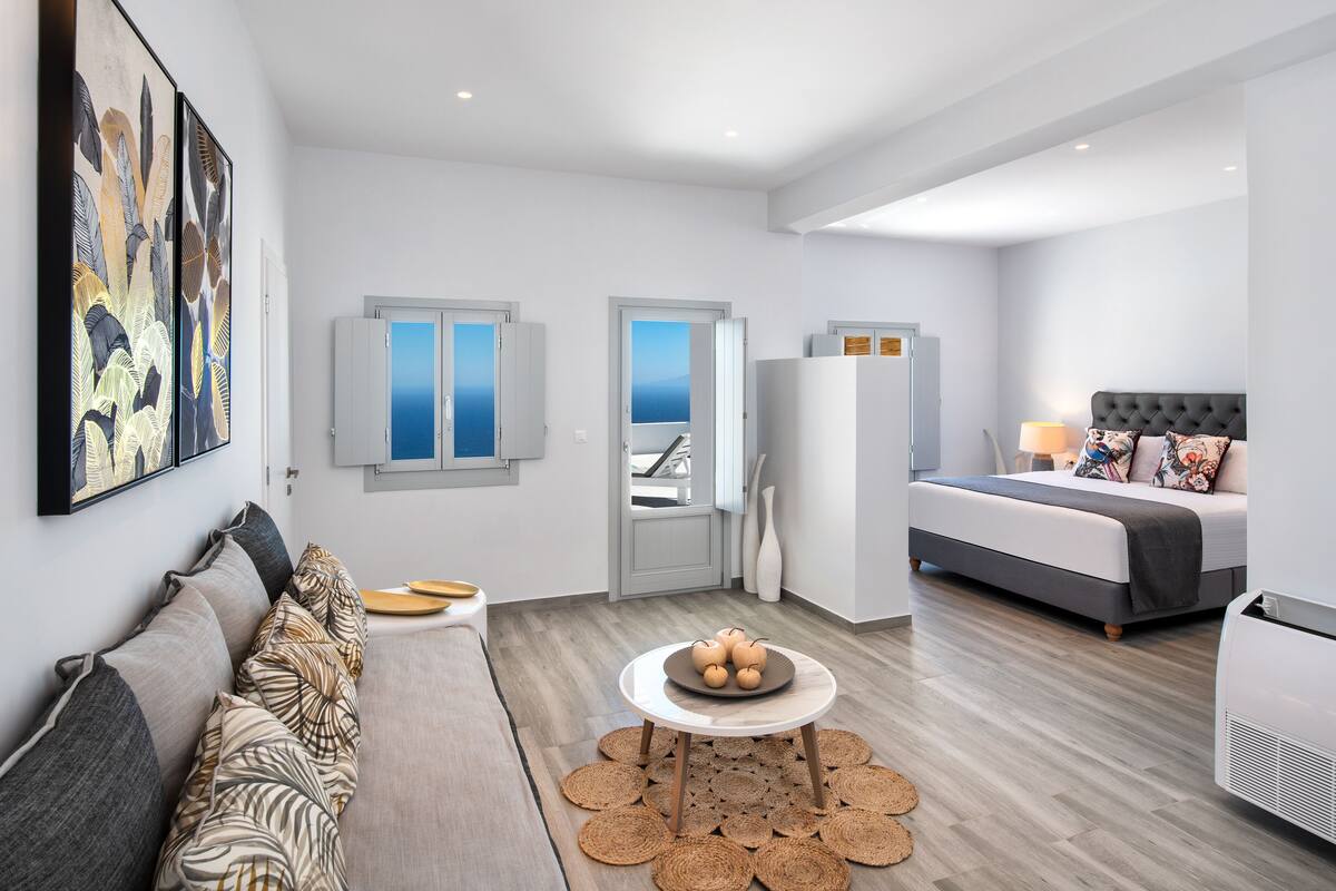 deluxe sea view suite with private pool | living area | 42-inch flat-screen tv with satellite channels, tv