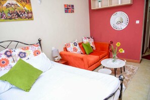 Individually furnished, desk, laptop workspace, iron/ironing board