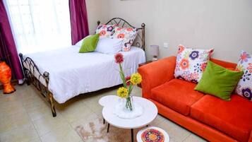 Individually furnished, desk, laptop workspace, iron/ironing board