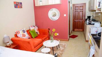 Individually furnished, desk, laptop workspace, iron/ironing board