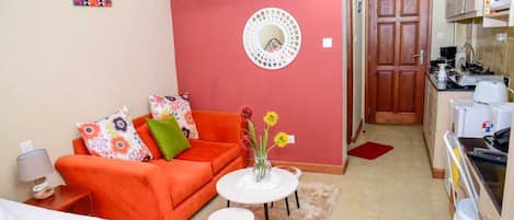 Individually furnished, desk, laptop workspace, iron/ironing board