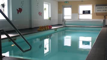 Alberca techada y alberca climatizada