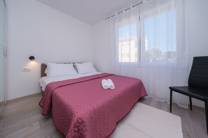 Apartemen | 1 kamar tidur, meja kerja, Wi-Fi gratis, dan seprai linen