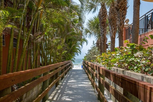 Great Value! Steps to Beach - Large Patio Area ~ Heated Pool ~ Free Parking - Ground Floor Condo