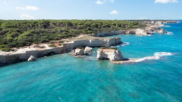 Private beach, free beach shuttle, sun-loungers, beach umbrellas