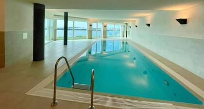 Penthouse apartment with stunning sea views, roof terrace, whirlpool & sauna