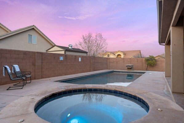 A swimming pool with a hot tub, lounge chairs, and a brick wall. - Escondido - PRIVATE POOL - Foosball and Ping Pong (Hurricane)