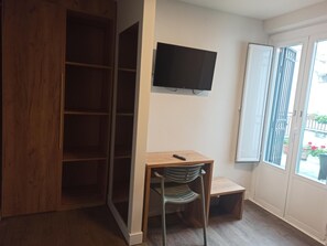 Desk, free WiFi, bed sheets