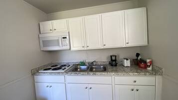 Fridge, stovetop, coffee/tea maker, toaster