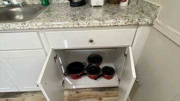 Fridge, stovetop, coffee/tea maker, toaster
