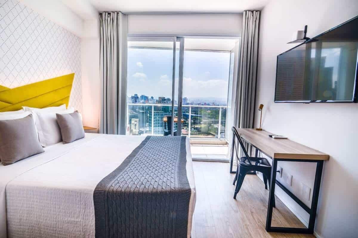 Standard Studio (559814) | Premium bedding, desk, laptop workspace, blackout drapes