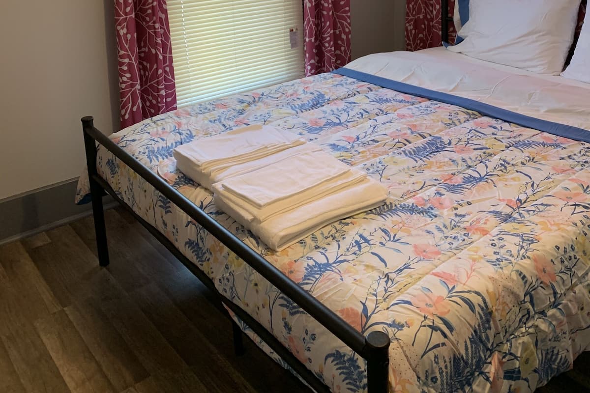 1 bedroom, desk, laptop workspace, iron/ironing board