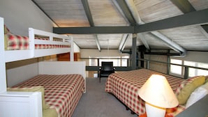 A room with two bunk beds, a desk, and a chair. - Sierra Park Villas #93 (Mammoth Lakes)