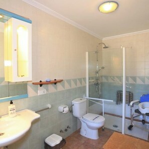 Bathtub, hair dryer, towels