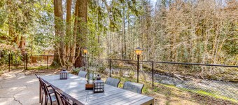 Dog-friendly, riverfront home w/ a wood-burning fireplace & views