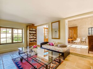TV, fireplace, books