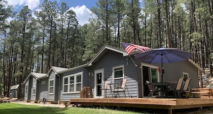 Peace and privacy await among the towering Pine Trees.