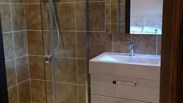 Combined shower/tub, hair dryer, towels, soap